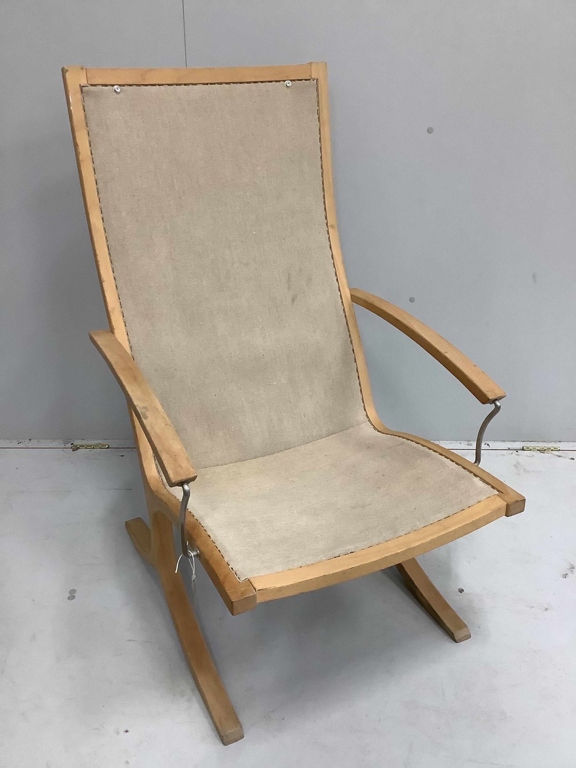 A Mogens Hansen chair frame, with later seat cushion, width 63cm, depth 73cm, height 104cm and footstool